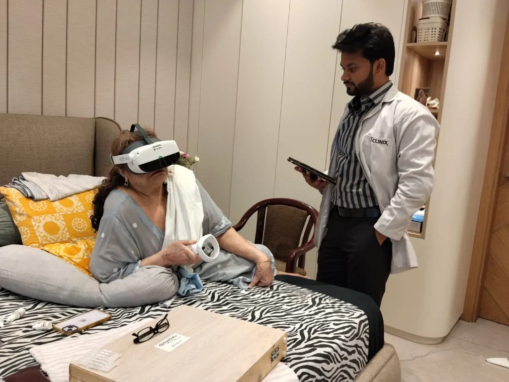 Patient wearing a visual field headset during a home eye test while a doctor watches