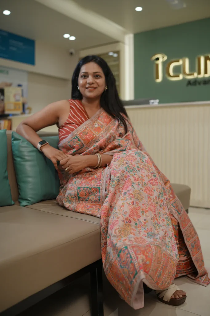 Dr. Shikha Gupta seated at the clinic